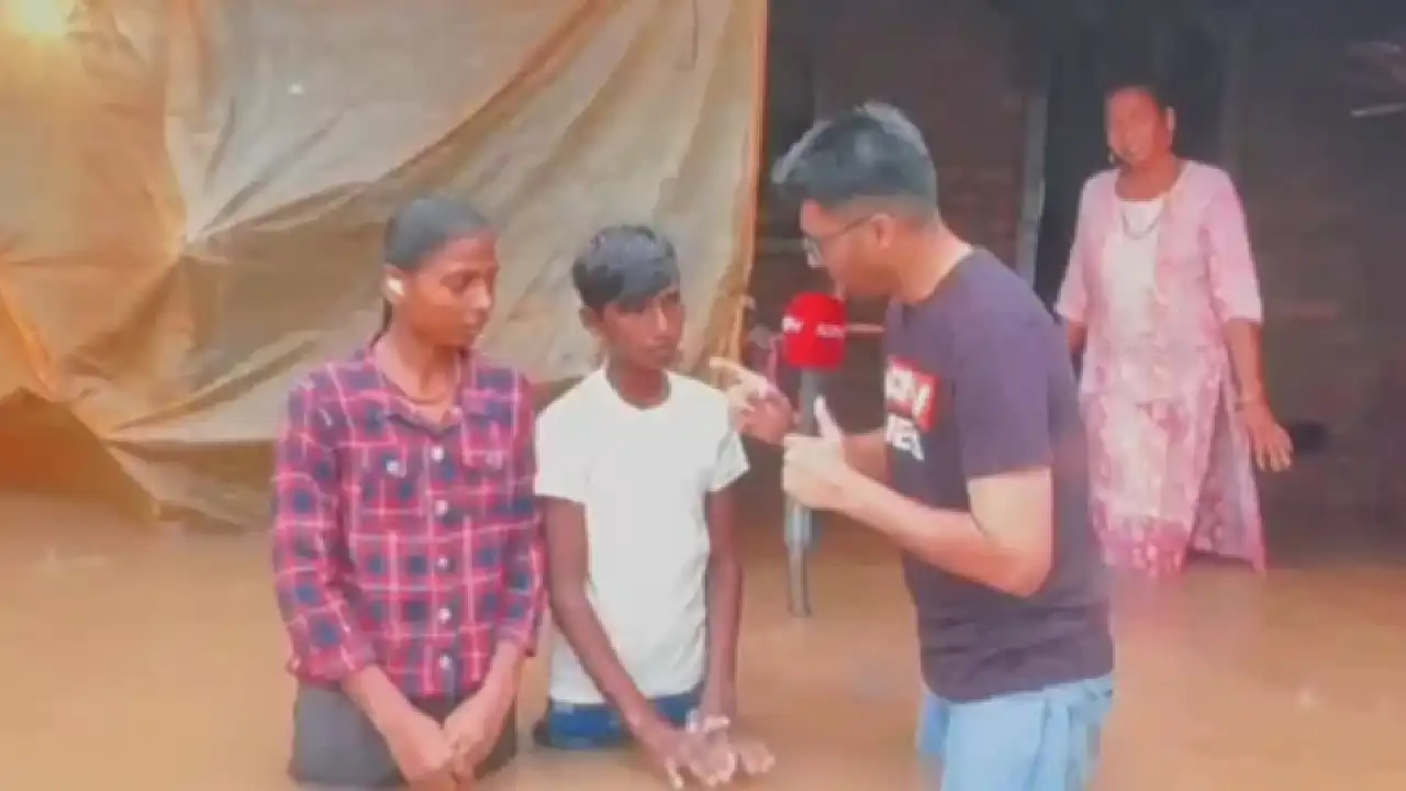 Gujarat flood Navsari boy Viraal engineer dream ഗുജറാത്ത് വെള്ളപ്പൊക്കം വിരാൾ ചിത്രം